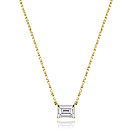 Gold necklace with a rectangular diamond pendant on a white background